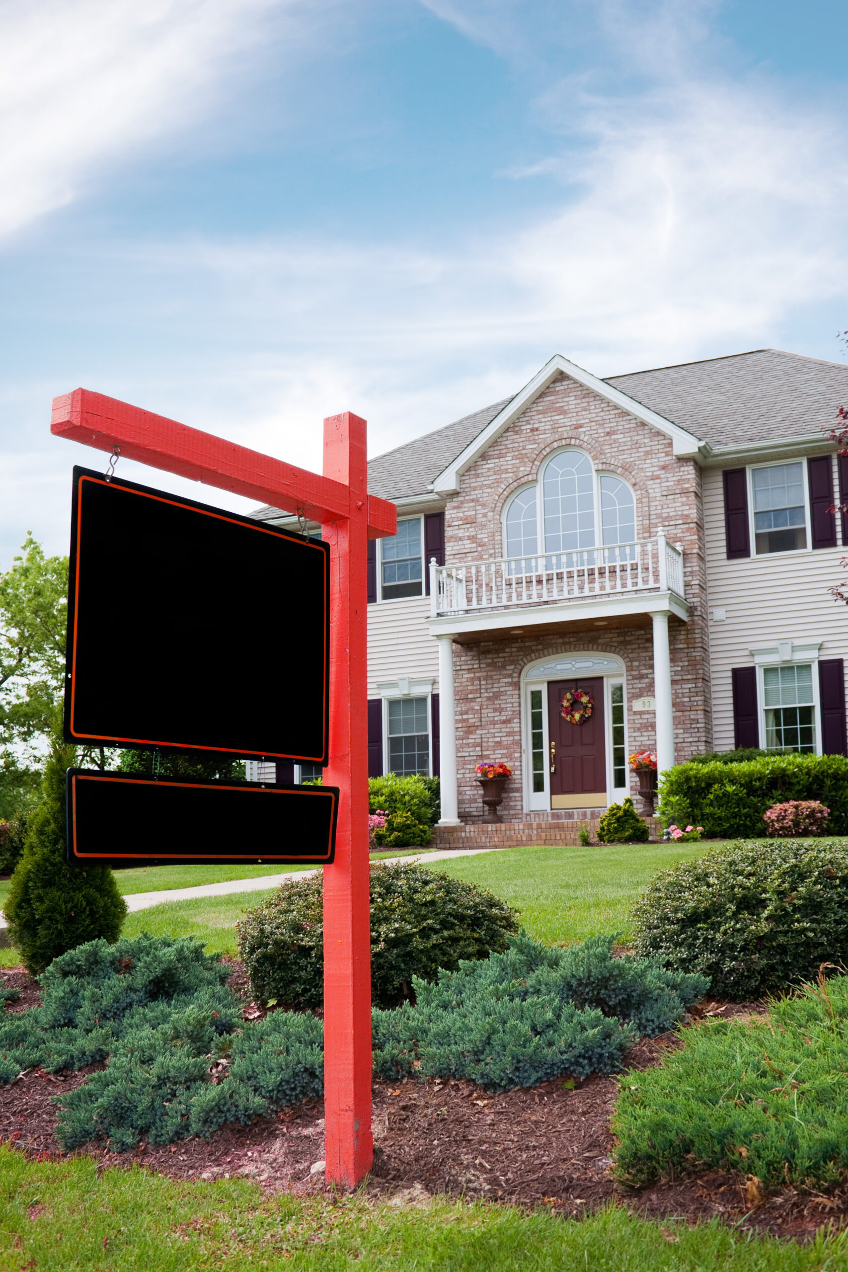 a nice luxury home with a blank for sale sign posted in front plenty of copy space on SBI 301040815 scaled